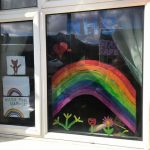 Drawing of rainbow in window